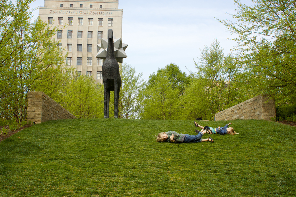 Kids rolling down a hill